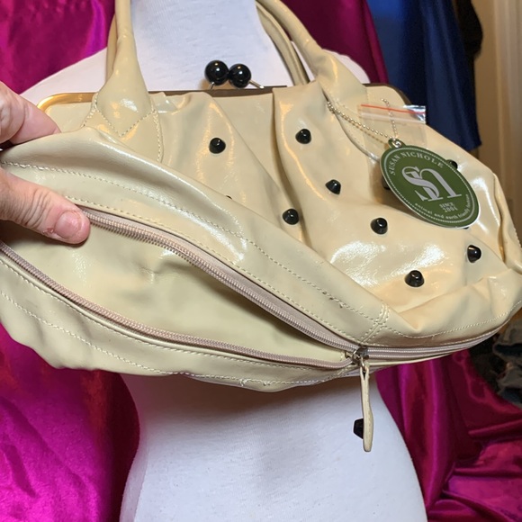 Very unique bag by Suzanne Nichole. Used two times with tag unzips aroun… - Picture 2 of 9